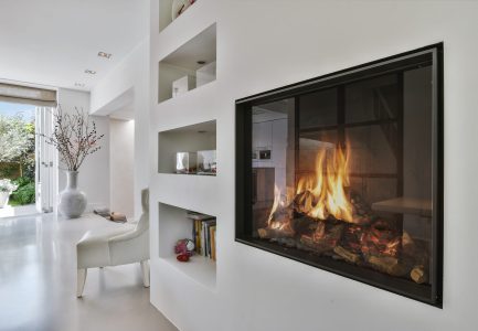 Full house remodels with a Modern built-in fireplace with shelves.