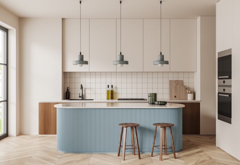 Small kitchen layout with light blue island.